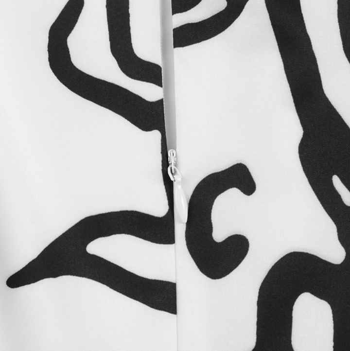 Anke - Jumpsuit mit Gesichter-Print