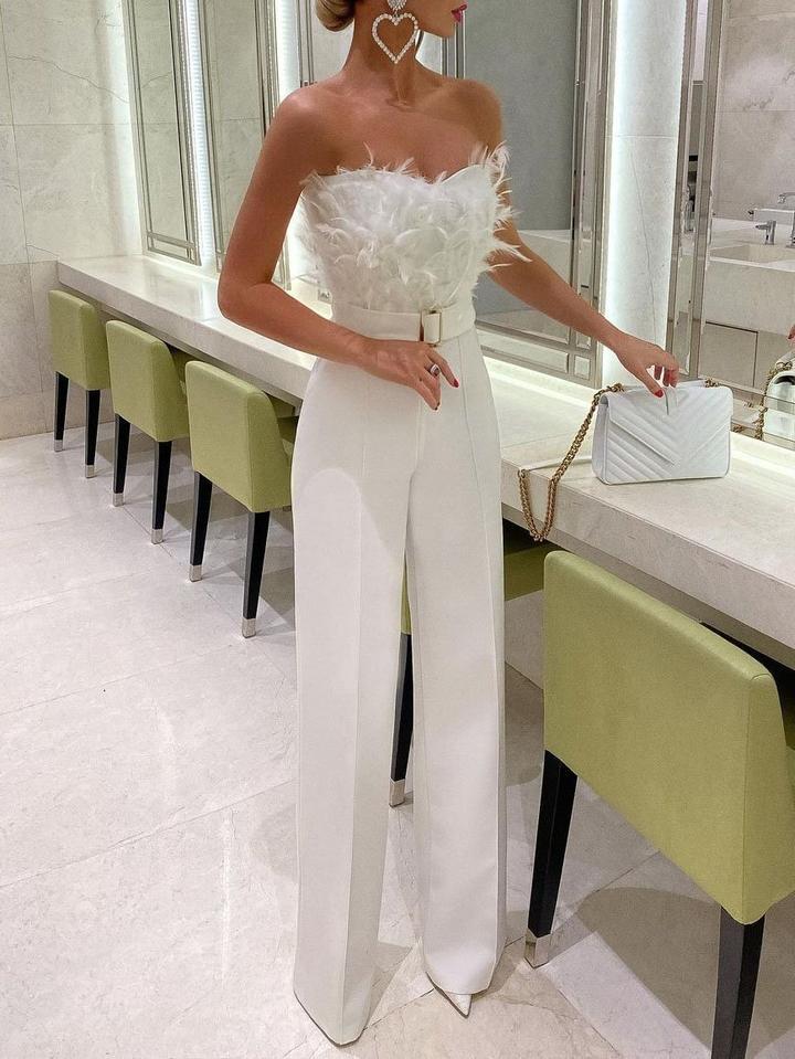 Tomke - Jumpsuit mit Federn
