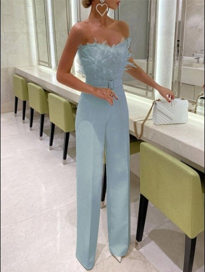 Tomke - Jumpsuit mit Federn